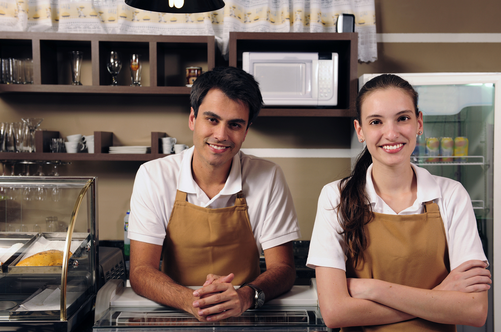 two employees in cafe